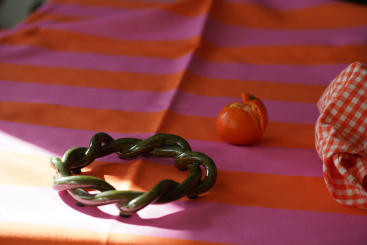 Striped table cloth in pink and orange